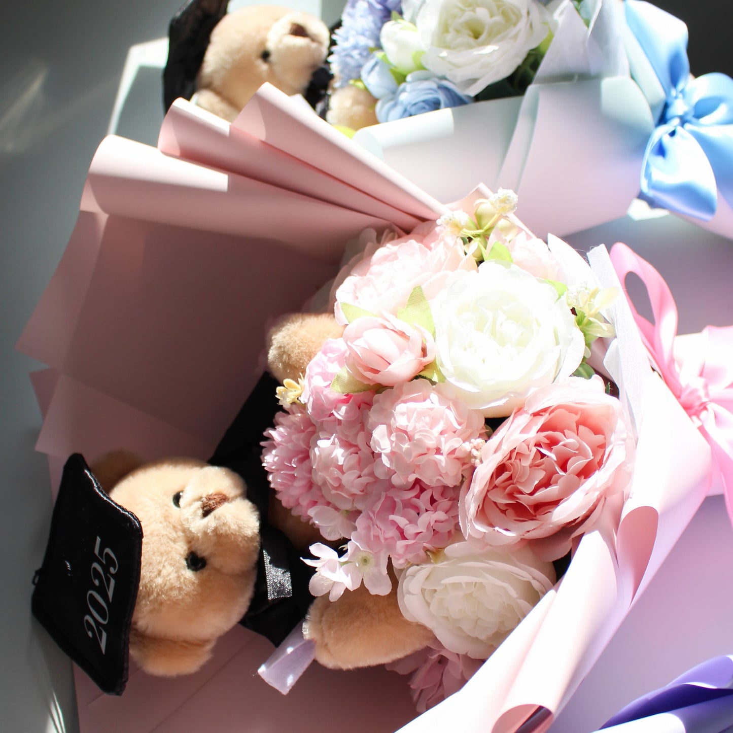 Bouquet of flowers with a teddy bear