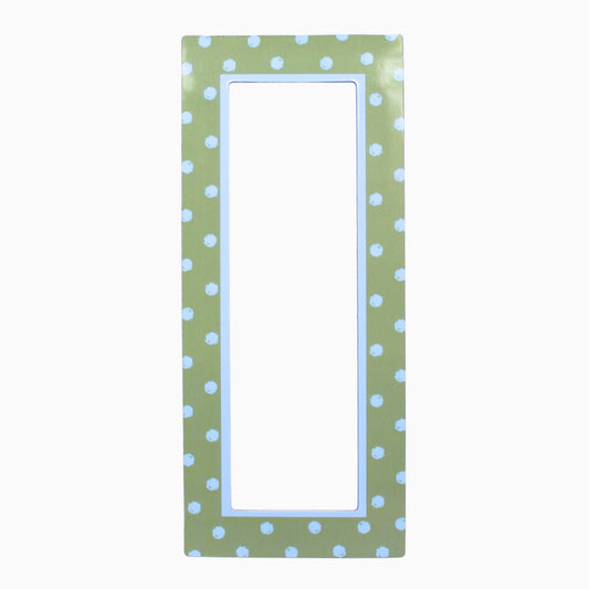 Rectangular magnetic photo booth frame with a green frame and white polka dots on a white background