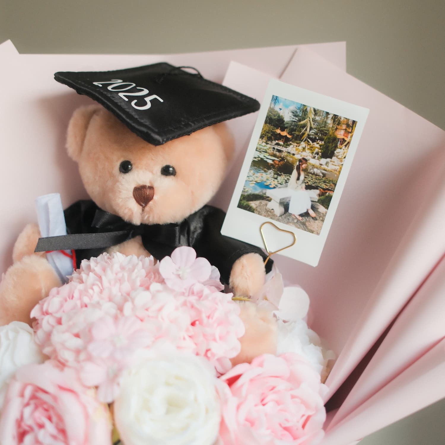 graduation bear bouquet with polaroid