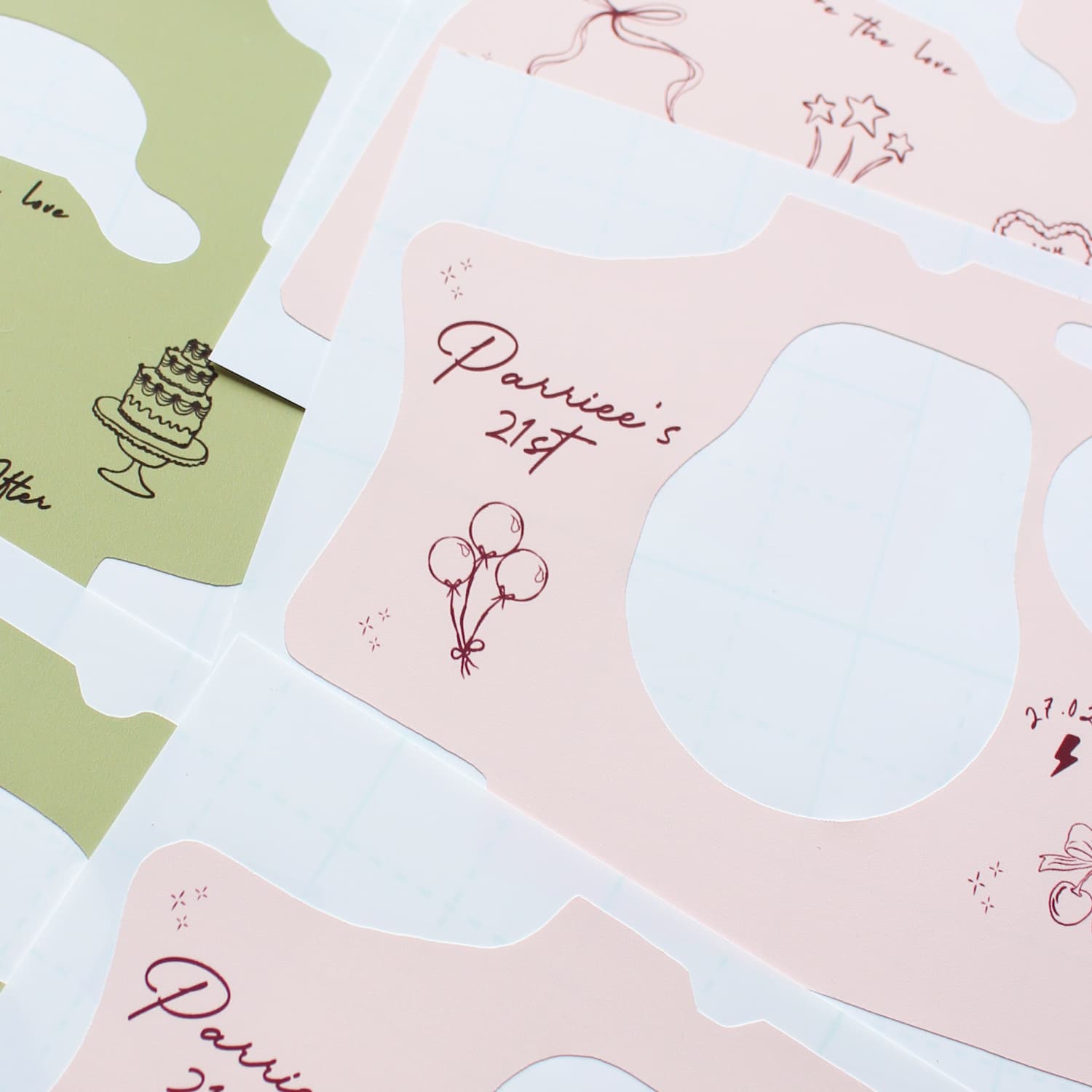 Three pink disposable camera wraps with 'Parriee's 21st' text and balloon design on a white background