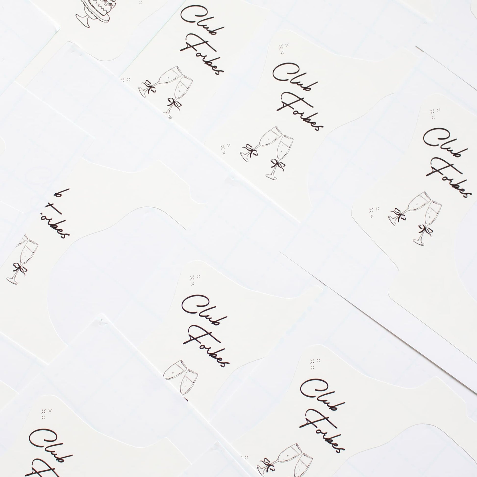 Repeating pattern of 'Club Forbes' logo kodak disposable camera wraps