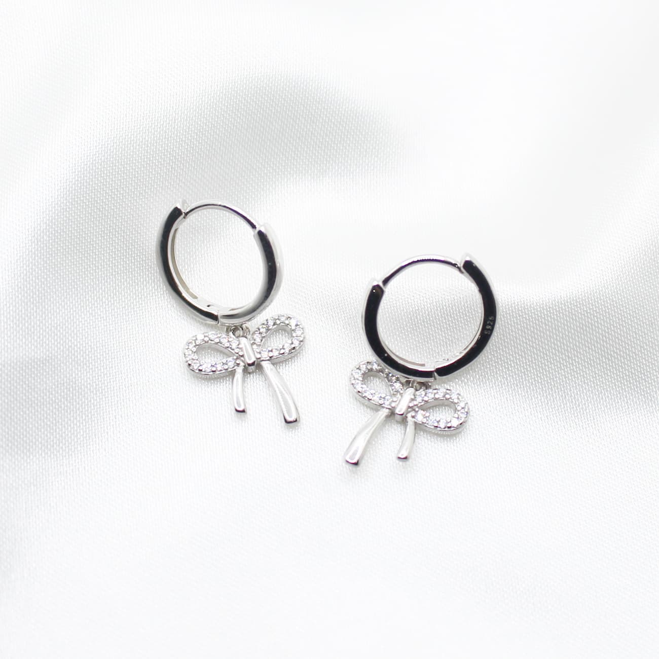 ava bow hoops silver