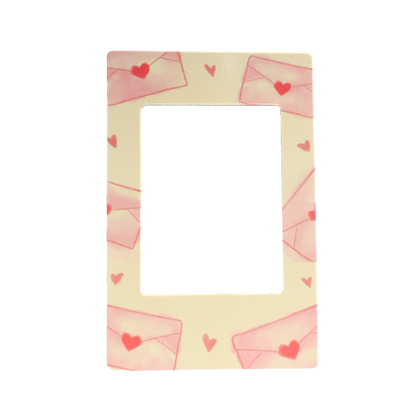 Magnetic photo frame with heart designs on a light yellow background