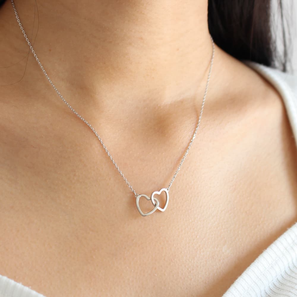 intertwined love heart necklace silver