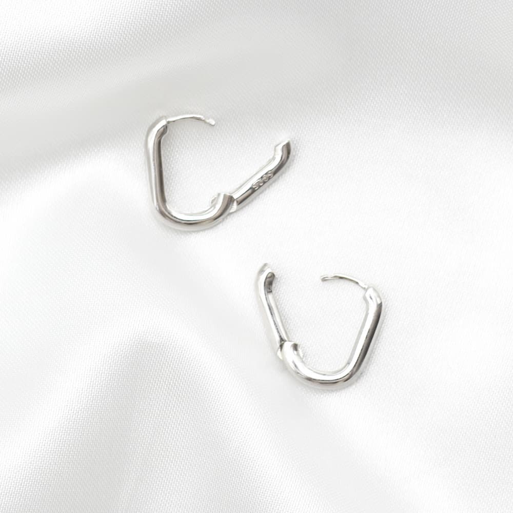 oval huggies oval hoops everyday silver hoops earrings