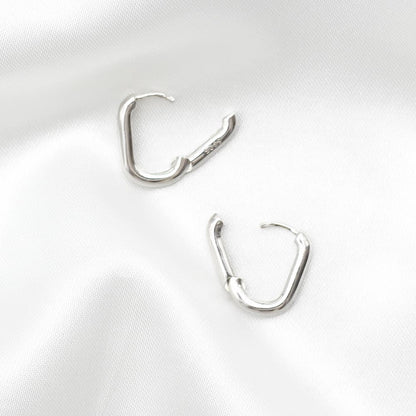 oval huggies oval hoops everyday silver hoops earrings